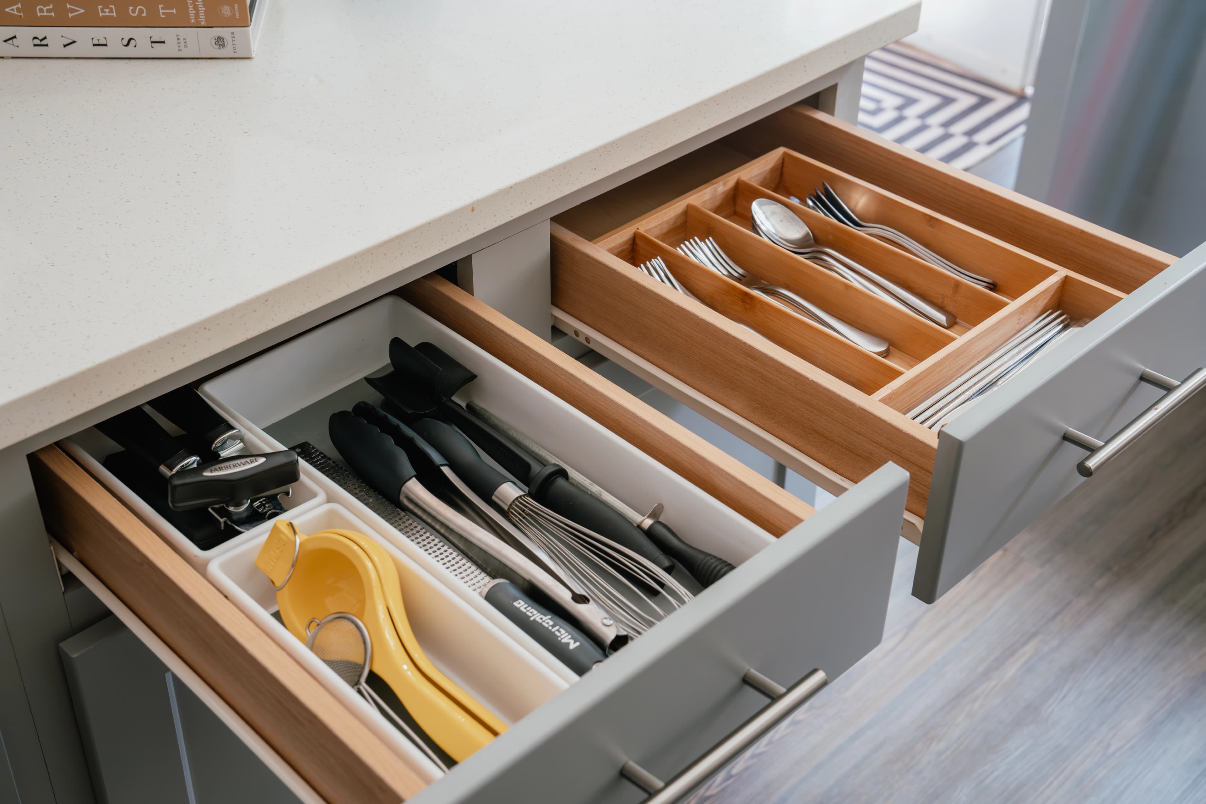 Beautiful organized kitchen drawers with utensils